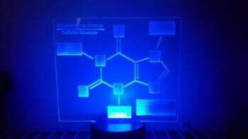 Caffeine molecule LED lamp with the color of the light set to blue
