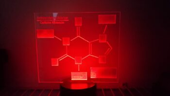 Caffeine molecule LED lamp with the color of the light set to red