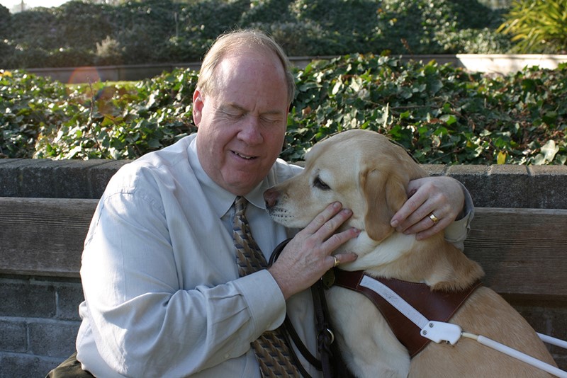 Michael Hingson with his dog guide, Roselle